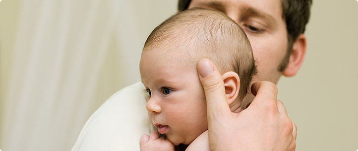 An image of child with his father.